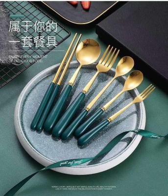 Emerald web celebrity tableware gold ceramic handle stainless steel
