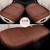 Car seat cushion full leather wearable five-seater general purpose car cushion small three-piece set in black and brown