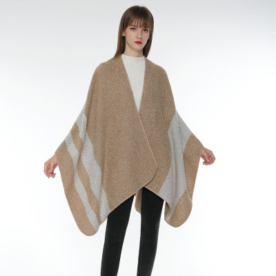 A popular new cashmere shawl with thick stripes and big slit across borders in Europe and The US