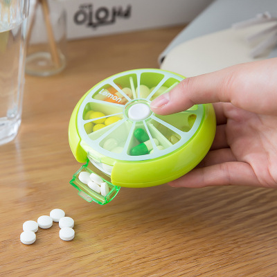 Lemon small portable pill box with seven Squares Rotating mini pill Medicine Dispensing pill box wholesale