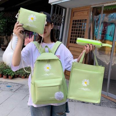 New school bag female Korean version backpack primary school students large capacity four-piece rucksack