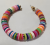Earring in chain bracelet with coloured ceramicite