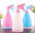 Hand clasp spray bottle