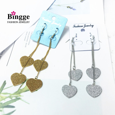 Foreign trade tail department stores European and American jewelry clearance heart earrings Korean type long earrings yiwu manufacturers direct exaggerated earrings