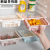 Plastic refrigerator storage container for refrigerated food in the kitchen