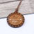 Time jewel necklace with wooden handguns