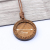 Time jewel necklace with wooden handguns