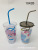 The factory directly sells the straw cup with printing cartoon high cover and stripe model 600ml water suction cup and muzzle cup of juice