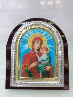 Orthodox Russian plate dripping religious picture frame of The Virgin Jesus