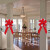 New large red bow decorations for Christmas trees are being sold by manufacturers