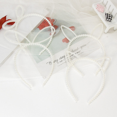Manufacturers direct Korean version of fashion hair clip headband pearl headband 2 yuan shop supply wholesale