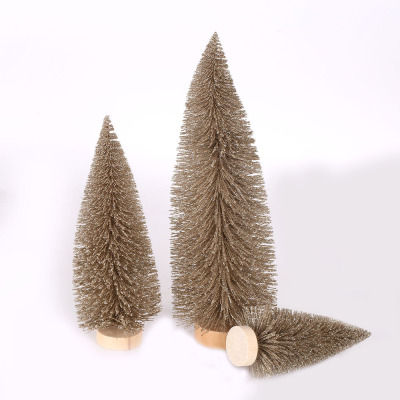 Christmas table tops are decorated with brown pine needles and mini Christmas trees dusted with powder