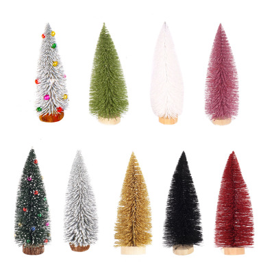 Christmas table tops are decorated with colorful pine needles and powdered mini Christmas trees