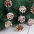 Christmas decorations with natural, real pinecones Christmas tree ornaments with white brim pinecones