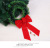 Manufacturers are selling new Christmas wreaths with large bows and green rattan rings