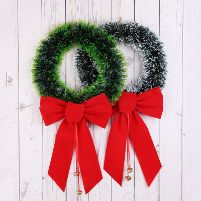 Manufacturers are selling new Christmas wreaths with large bows and green rattan rings