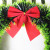 Christmas decorations in hotel shop Windows with green/white bow madder garlands