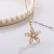Wish's creative fashion Plum blossom pendant necklace for cross-border exclusive selling of hand-inlaid zirconium floral pendant