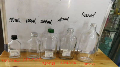 Factory Direct Sales 50 Ml 100 Ml 200 Ml 250 Ml Flat Glass Bottle Oblique Shoulder Glass Bottle