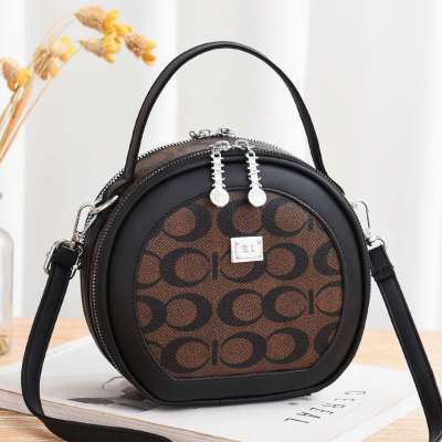Fall Winter Trend Fashion High Quality PU Leather Shoulder Bag Polyester Messenger Bag Long Shoulder Strap All-Matching Custom Small round Bag Wholesale