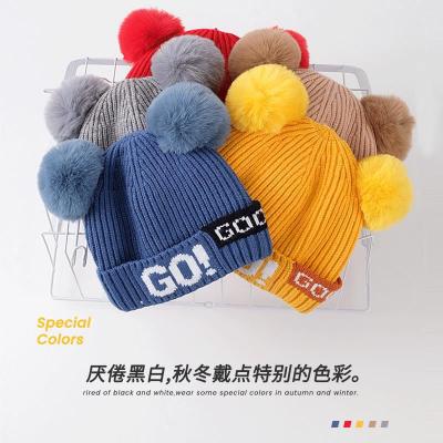 Autumn and Winter Children's Knitted Hat 20 New Warm Alphabet Knitting Wool Hat Children's Double Fur Ball Sleeve Cap