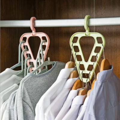 New Magic Hanger Plastic Rotatable Clothes Storage Shelf
