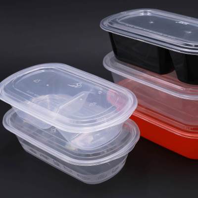 Disposable Oval to-Go Box Black Grid Take-out Box Double Grid Lunch Box Transparent Orange Color Fruit Salad over Rice