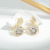 Korean Fashion Zircon Hollow Petal Stud Earrings Female Sterling Silver Needle Camellia Earrings to Make round Face Thin-Looked Earrings Jewelry
