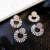 European and American Autumn and Winter New SUNFLOWER Alloy Diamond Rhinestone Glass Drill Earrings Female Super Flash Hipster Banquet Ear Rings