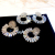 European and American Autumn and Winter New SUNFLOWER Alloy Diamond Rhinestone Glass Drill Earrings Female Super Flash Hipster Banquet Ear Rings