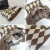 Women's New Shoulder Woven Bag Black and White Plaid Clutch Korean Ins Special-Interest Design Knitted Chessboard Plaid Bag