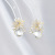 Early Spring 2022 New Elegant Stud Earrings for Women Sterling Silver Needle Niche Design Petal Ear Accessory Cat's Eye