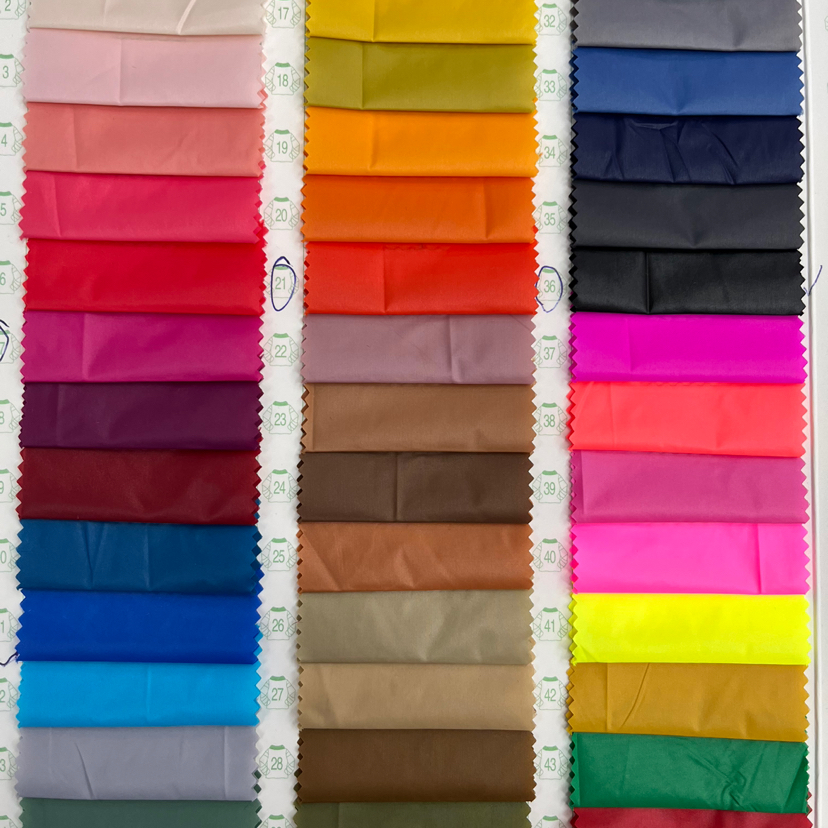 爆款防水防晒衣面料 380尼丝纺羽绒服棉服风衣饰品袖套箱包布