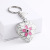 Factory Supply Stainless Steel Pink Small Flower Heart Keychain Backpack Automobile Hanging Ornament Pendant Hanging Ornament Wholesale