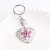 Factory Supply Stainless Steel Pink Small Flower Heart Keychain Backpack Automobile Hanging Ornament Pendant Hanging Ornament Wholesale