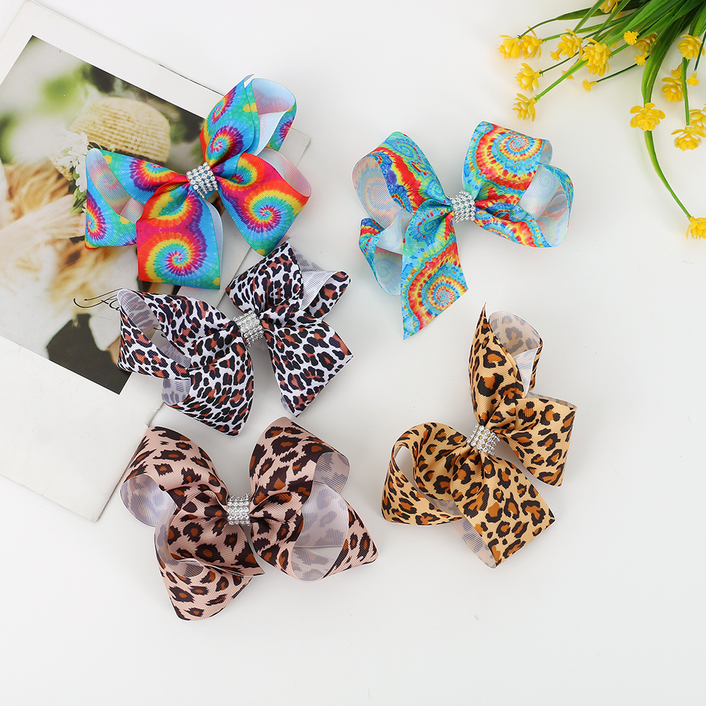 欧美风跨境发夹直供豹纹狂野个性女式蝴蝶结碎发一字夹鸭嘴夹饰品
