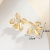 Boutique Copper Plated Real Gold Inlaid 5A Zircon High Quality Stud Earrings Fashion Jersey