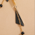Japanese and Korean Ear Hook Black Knife-Shaped Triangle Chain Stud Earrings Female Hipster Fashion Titanium Steel Earrings