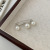 Pearl Bow Anti-Exposure Brooch Collar Decorative Pin Women's New Special-Interest Design Buttons in 2022