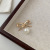 Pearl Bow Anti-Exposure Brooch Collar Decorative Pin Women's New Special-Interest Design Buttons in 2022