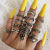 European and American Hot Women's Ring Set Open Skull Hand Bone Snake Flower Belt Leaves Knuckle Ring Suit