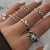 Europe and America Cross Border New Gossip Snake Leaf Ring Flower Love Butterfly Skull Chain Knuckle Ring Suit