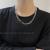 European and American Fashion Double-Layer Pearl Necklace Women's Wholesale Ins Style Hip Hop Fashion Stitching Love Chain Sweater Chain