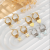 Special-Interest Design Feeling a Set of Four Pairs of Peach Heart XINGX Butterfly Ear Clip Temperament Fashion Trend