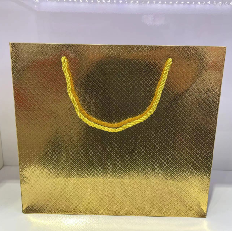 新款镭射白卡礼品袋 金色手提袋 日用品袋