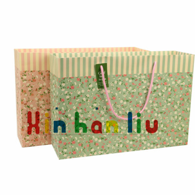 Direct spot bag gift bag paper bag custom hand rope paper packaging low quality floral garden style