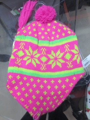Pink snowflake pattern knit cap.