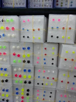 Zircon earrings in a white box