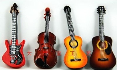 High-end refrigerator with guitar violin and violin.
