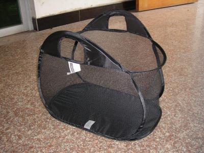 A laundry basket is enclosed